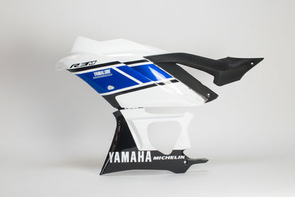 Motorcycle fairing with Yamaha and Michelin branding on a white background