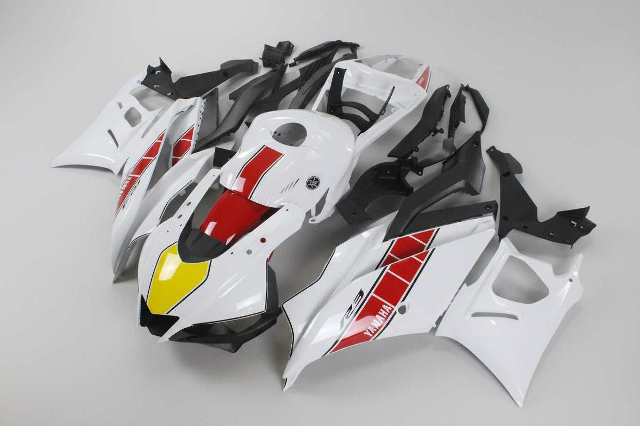 Motorcycle body panels with red, yellow, and black design on a white background