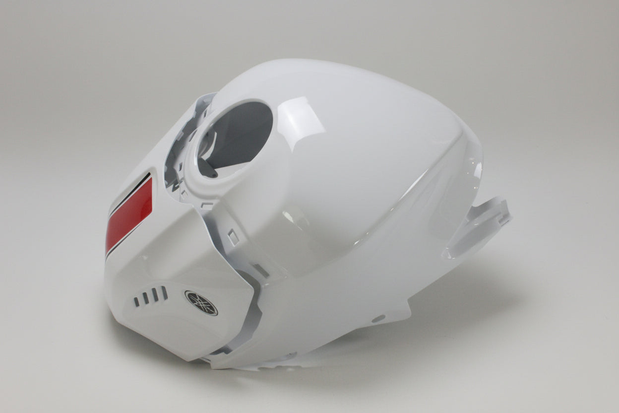 White motorcycle fairing with a red accent on a white background