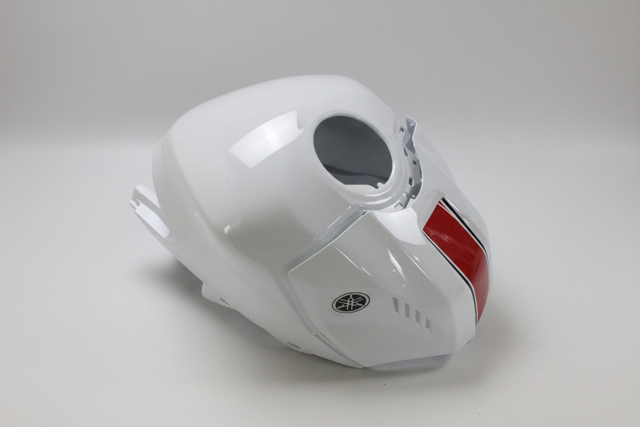 White motorcycle fuel tank with red stripe and Yamaha logo on a white background