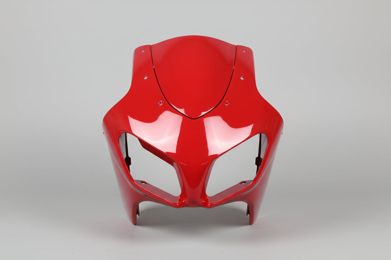 Red motorcycle fairing on a white background