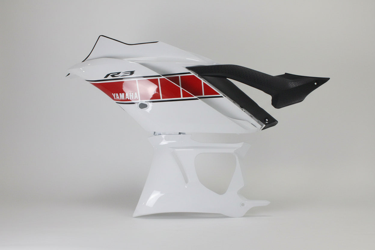 Motorcycle fairing with Yamaha logo on a white background