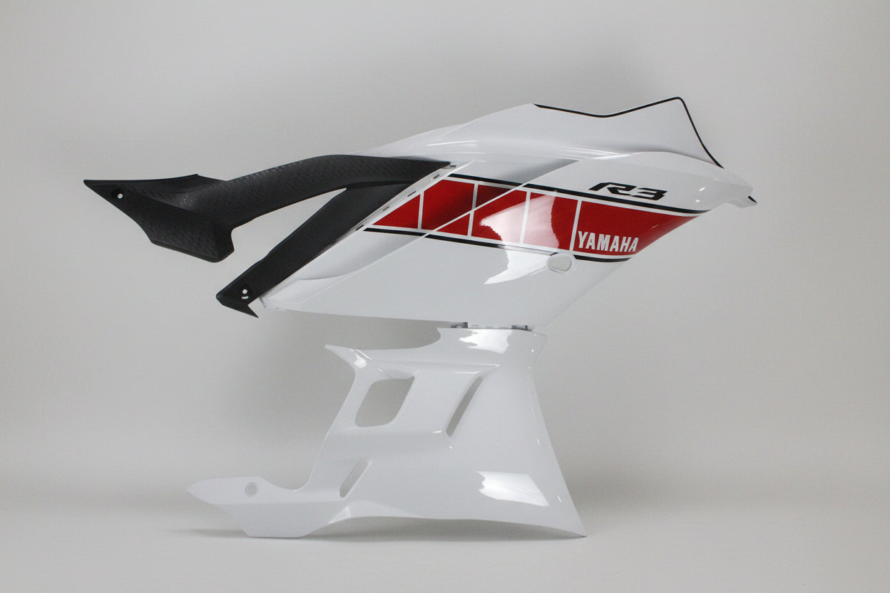 Motorcycle fairing with Yamaha logo on a white background