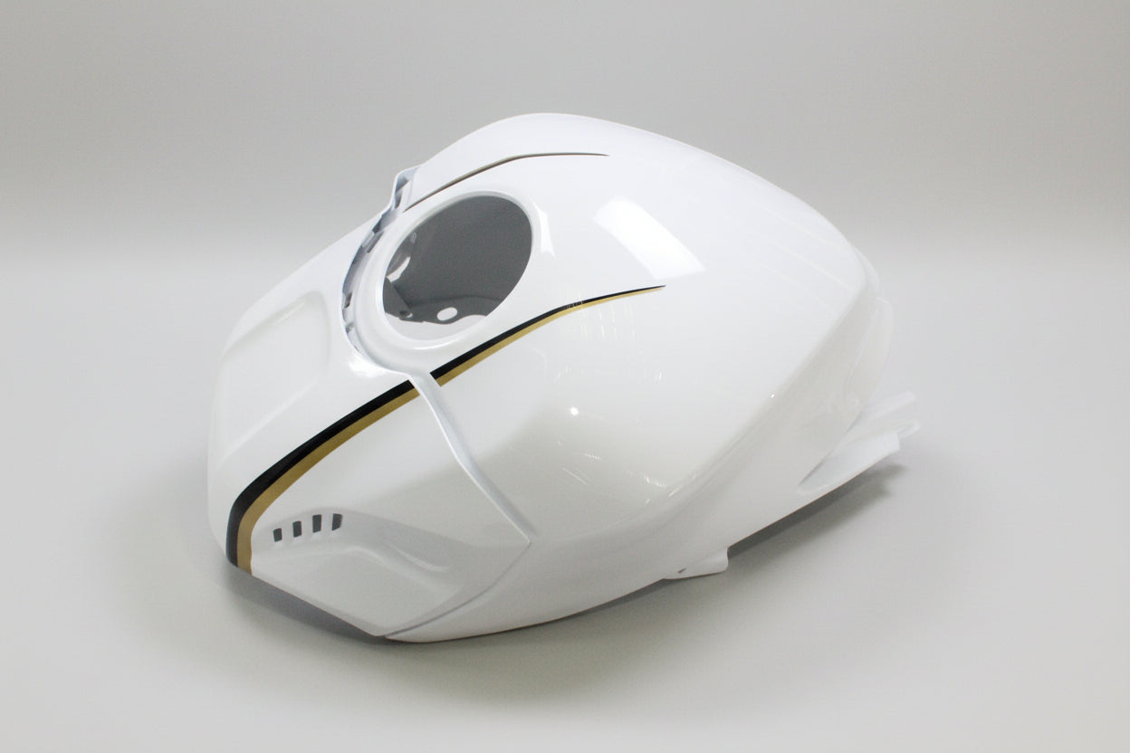 White motorcycle fuel tank with gold accent on a white background