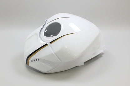 White motorcycle fuel tank with gold accent on a white background