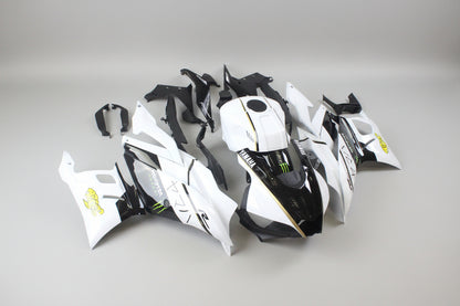 Motorcycle bodywork pieces with branding on a white background