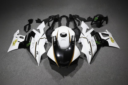 Motorcycle bodywork pieces on a gray background