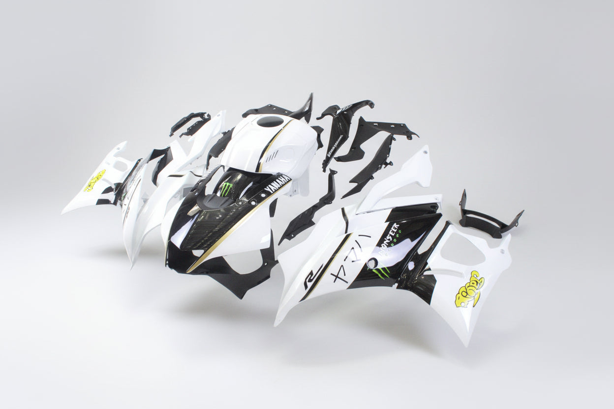 Motorcycle bodywork with branding on a white background