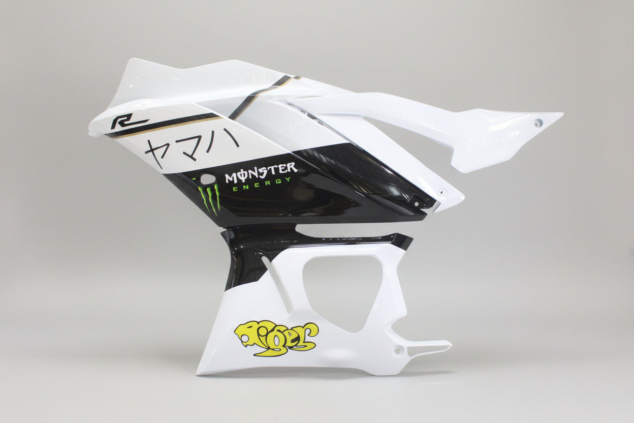 Motorcycle fairing with branding on a white background