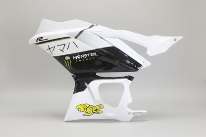 Motorcycle fairing with branding on a white background