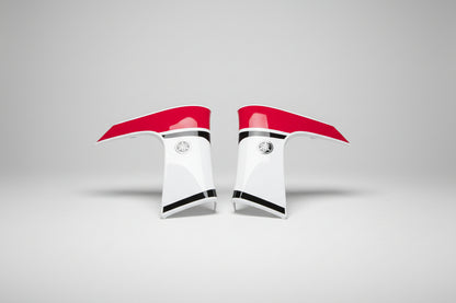 Red, white, and black motorcycle fairings with Yamaha logo on a white background