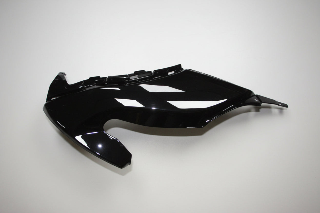 Black motorcycle fairing on a white background