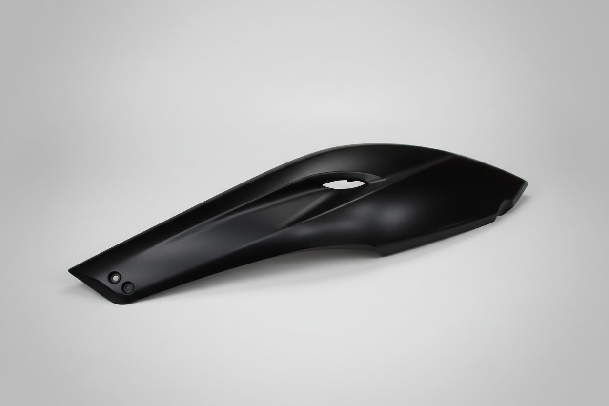 Black motorcycle fender on a white background