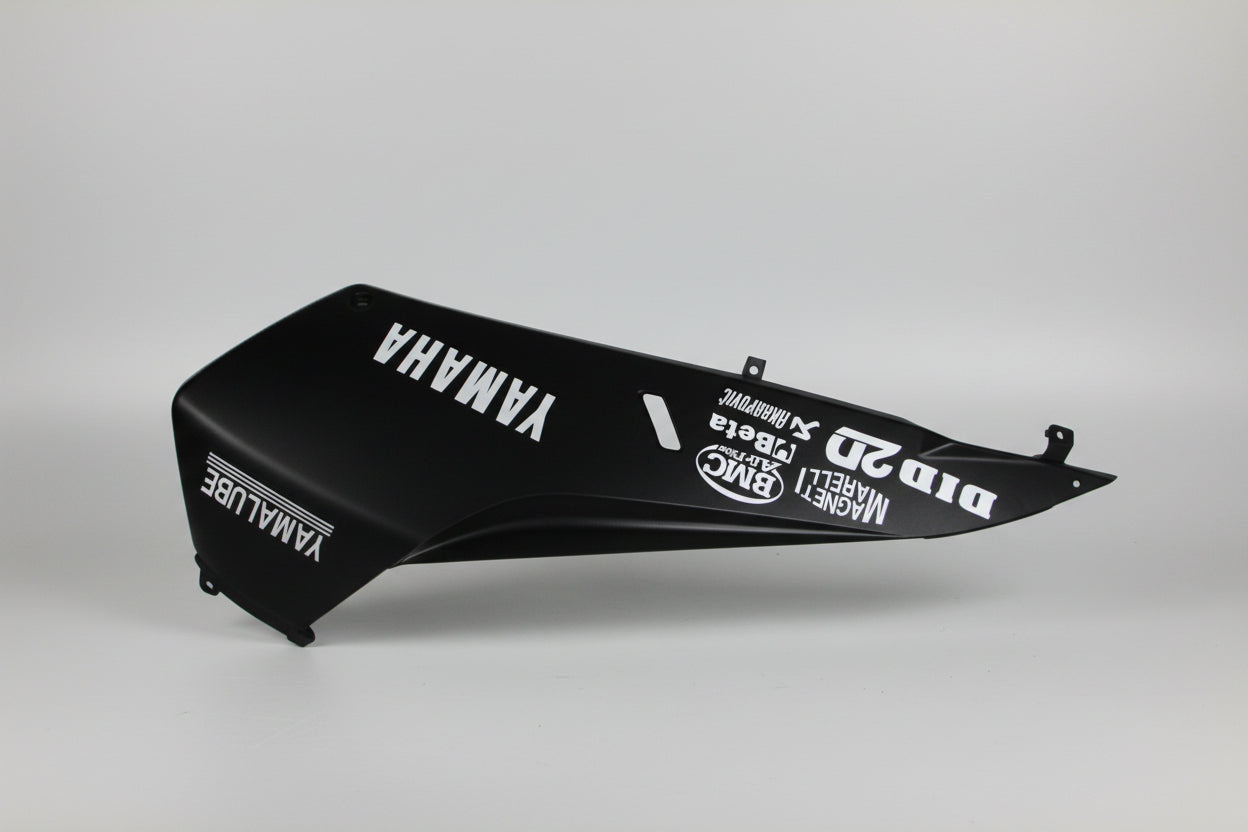 Black motorcycle fender with branding on a white background