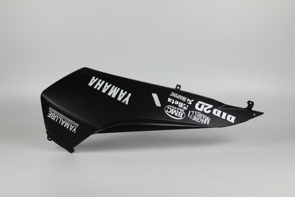Black motorcycle fender with branding on a white background