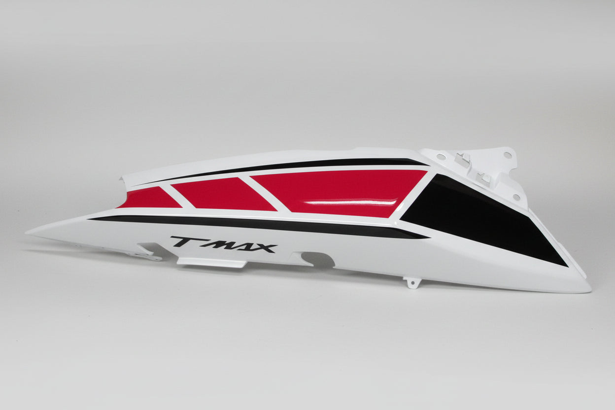 Motorcycle fairing with red and black design on a white background