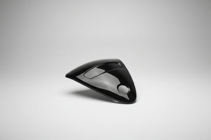 Black triangular car mirror cover on a white background