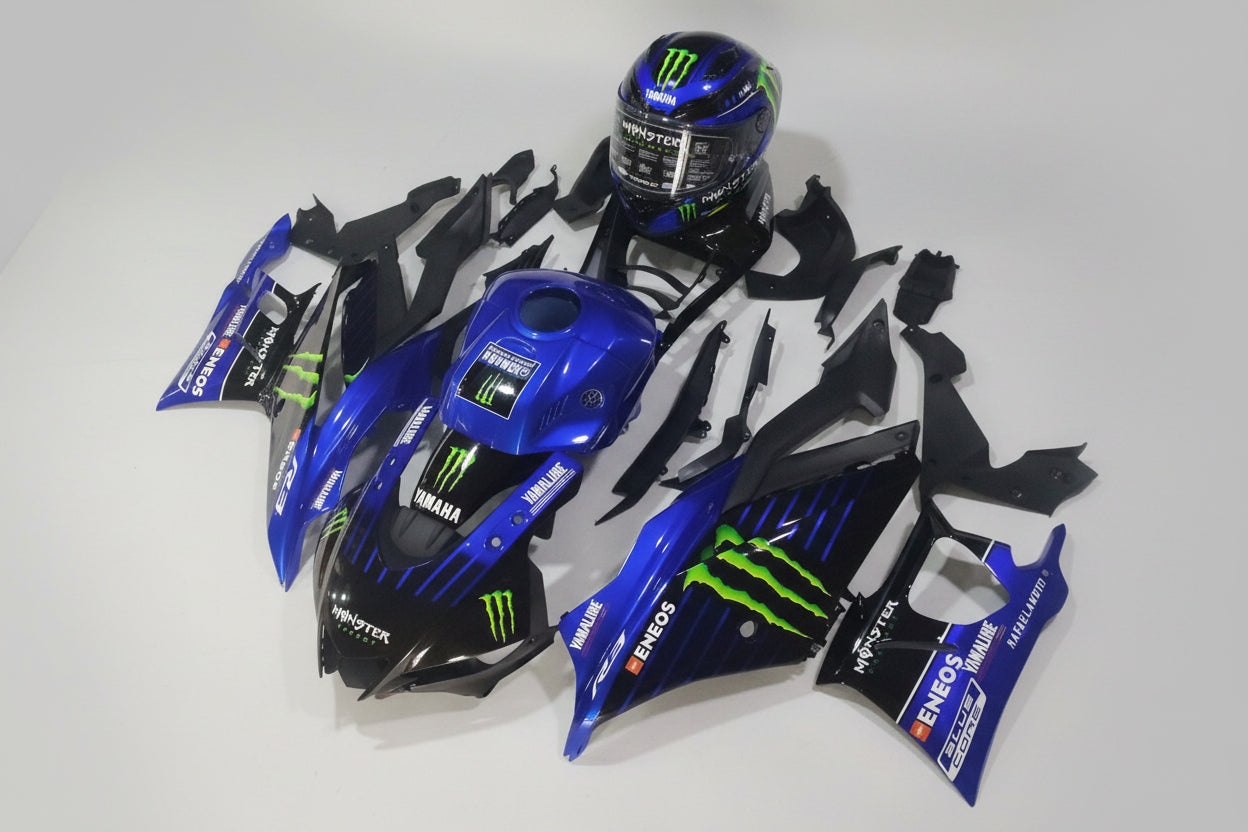 Motorcycle bodywork pieces with Monster Energy branding on a white background