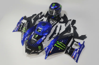 Motorcycle bodywork pieces with Monster Energy branding on a white background